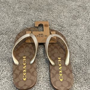 Women’s size 7 Coach flip flops